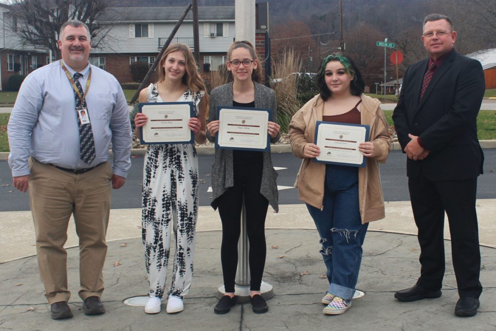 Pictured from left to right: JM Assistant Principal Geno Polsinelli, Victoria Finley, Megan Schwing, Savannah Carter and K of C Council 1907 Grand Knight Lou Richmond.