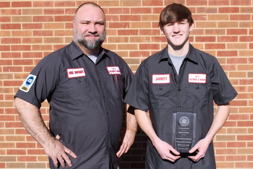 Pictured from left: Collision Repair teacher Joe Wendt and CTE Student of the Month Jarrett Groves.