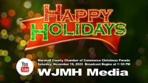 Graphic that says Happy Holidays with the YouTube logo. The white text reads: Saturday, November 19, 2022, at 1:55 pm WJMH Media will provide a live stream of the 52nd annual Marshall County Chamber of Commerce Christmas Parade