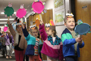 Students parade down the hallway.