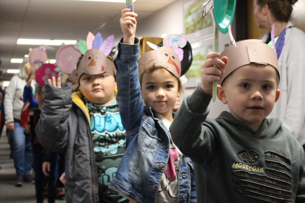 Students parade down the hallway.