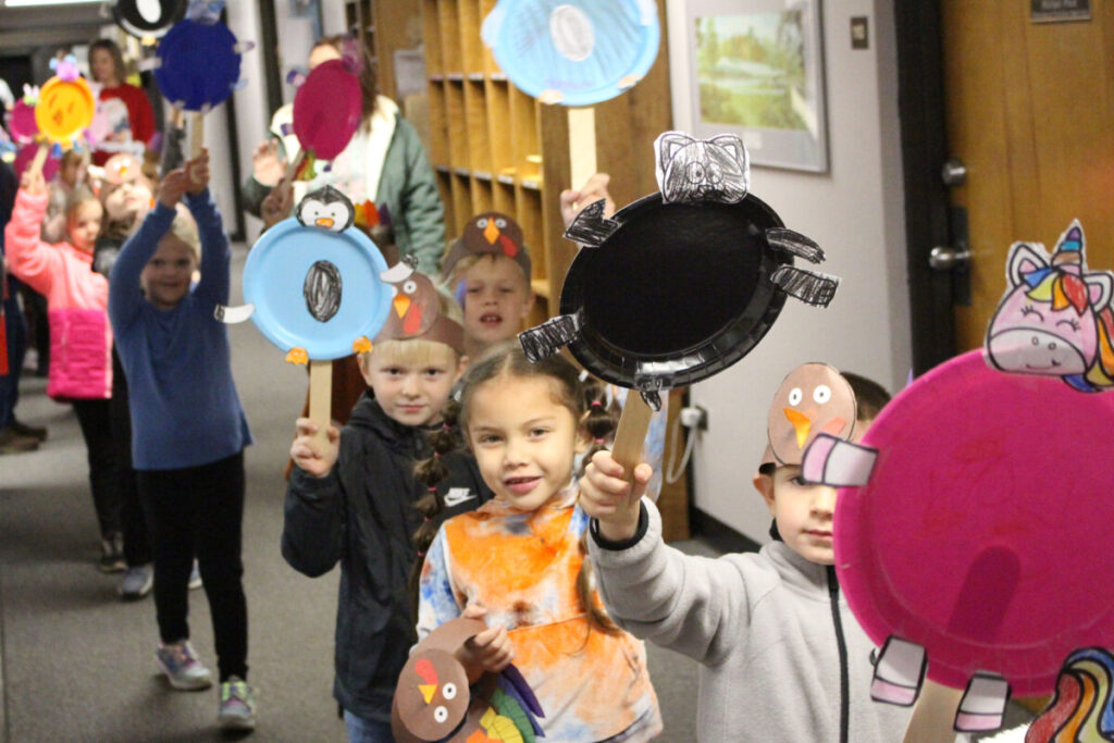 Students parade down the hallway.