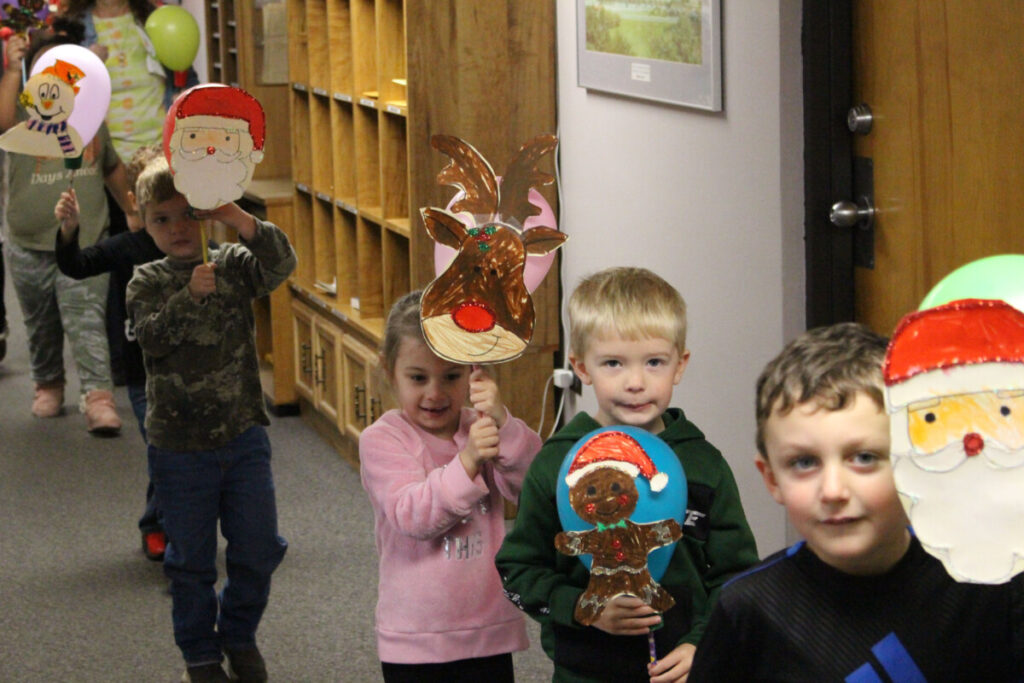 Students parade down the hallway.