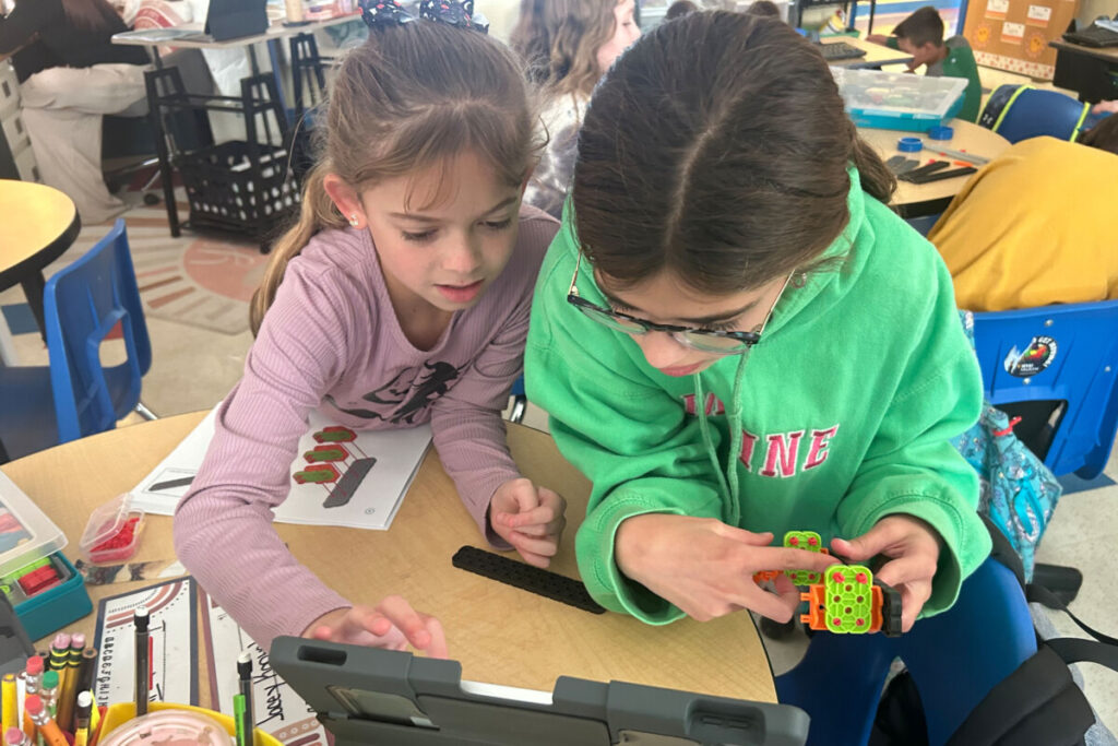 Hilltop Elementary students work on robotics projects. 