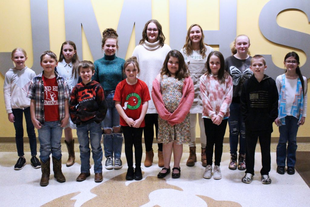 Students who read their stories during the Young Writers Tea are pictured. Front row from left: Brock Loudermilk, Cody Clutter, Emilia Goldsmith, Hazel Long, Taylynn Courtwright and Emmitt Thayer. Back row from left: Adaline Morgan, Hattie Brautigan, Cheyenne Harvey, Sadi Willis, Ella Games, Abby Allman and Kenzie Polsinelli.