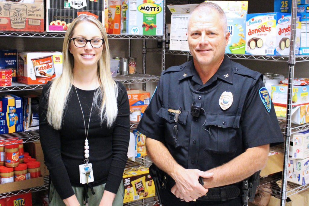 Pictured from left in the school’s food pantry is Central Elementary Counselor Jenna Dompa and Moundsville Police Chief Tom Mitchell. Money collected in November will be used to restock the shelves to help feed kids during the weekend.