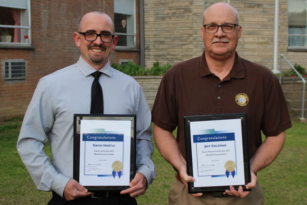 Pictured from left: Teacher of the Year Gavin Hartle and Service Personnel Member of the Year Jeffrey Coleman.