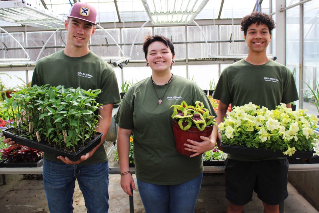 Pictured from left are JMHS Greenhouse Technology students B. Carroll, K. Phillips and A. Dudley. 
