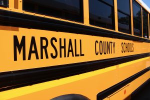 Side view of yellow Marshall County Schools bus