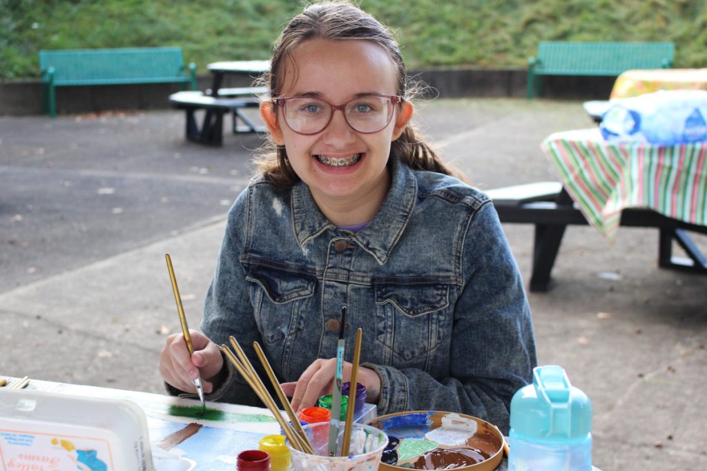 Kenzie Church, a student at Moundsville Middle School, shows off her artists skills at the Ohio Valley Plein Air Paint Out.