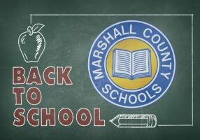 2021 Back to School Chalk Board WEB Back to School written in red chalk with the Marshall County Schools logo drawn with chalk.