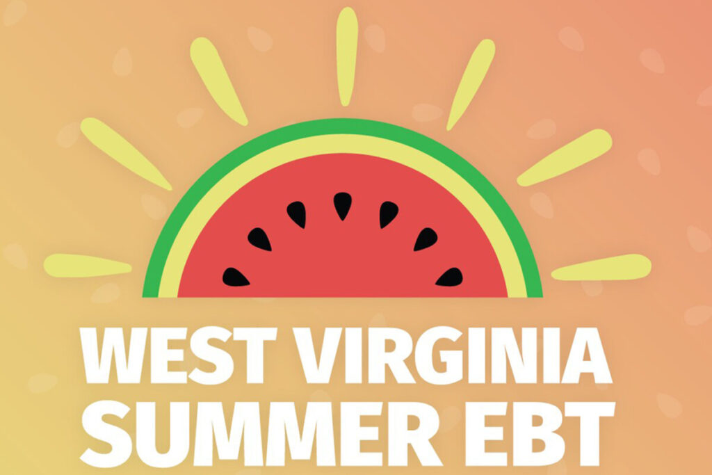 WV SEBT with a piece of watermelon that looks like a sun.