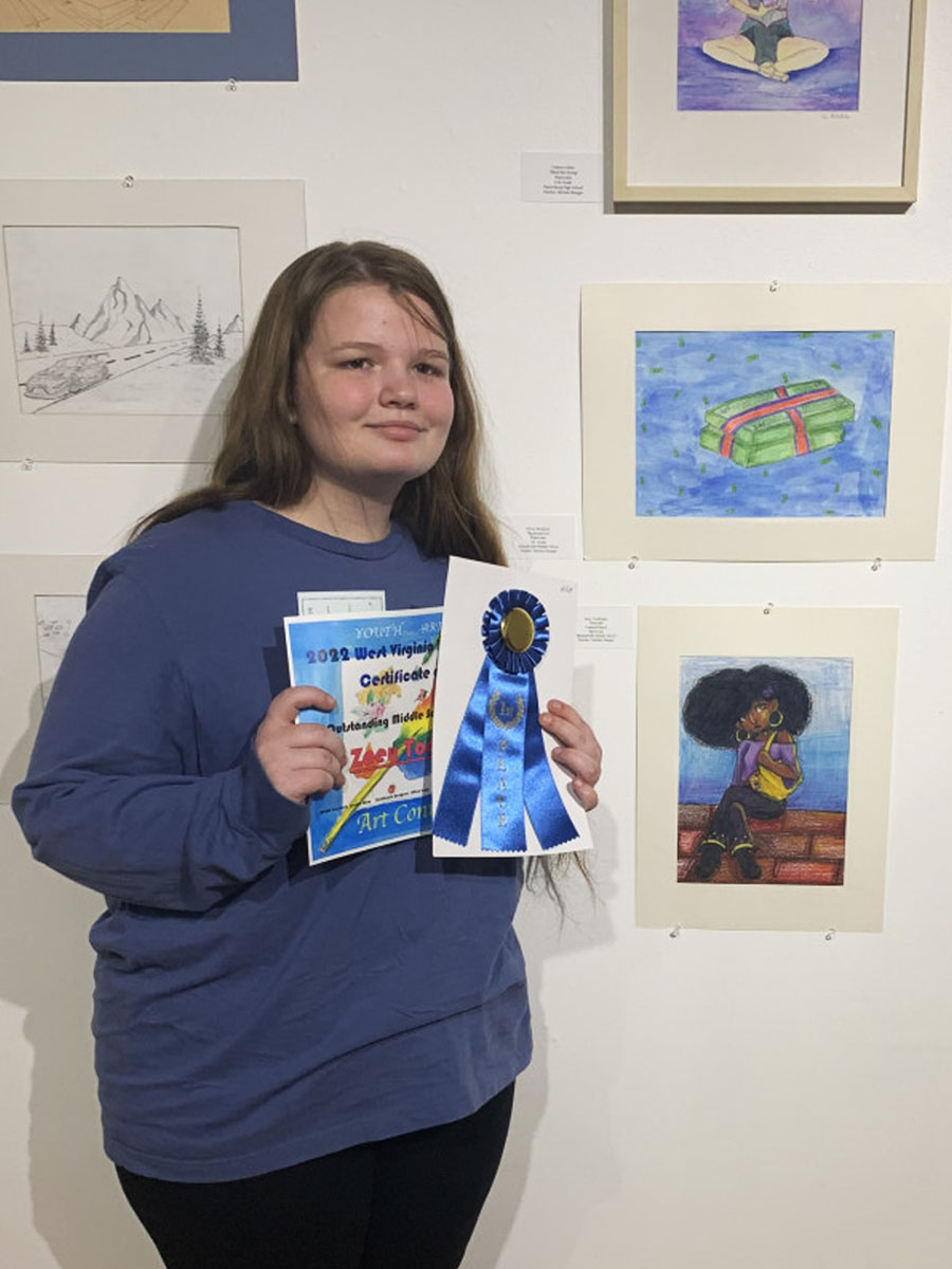 Zoey Toothman with her winning colored pencil artwork titled 'Butterfly'.