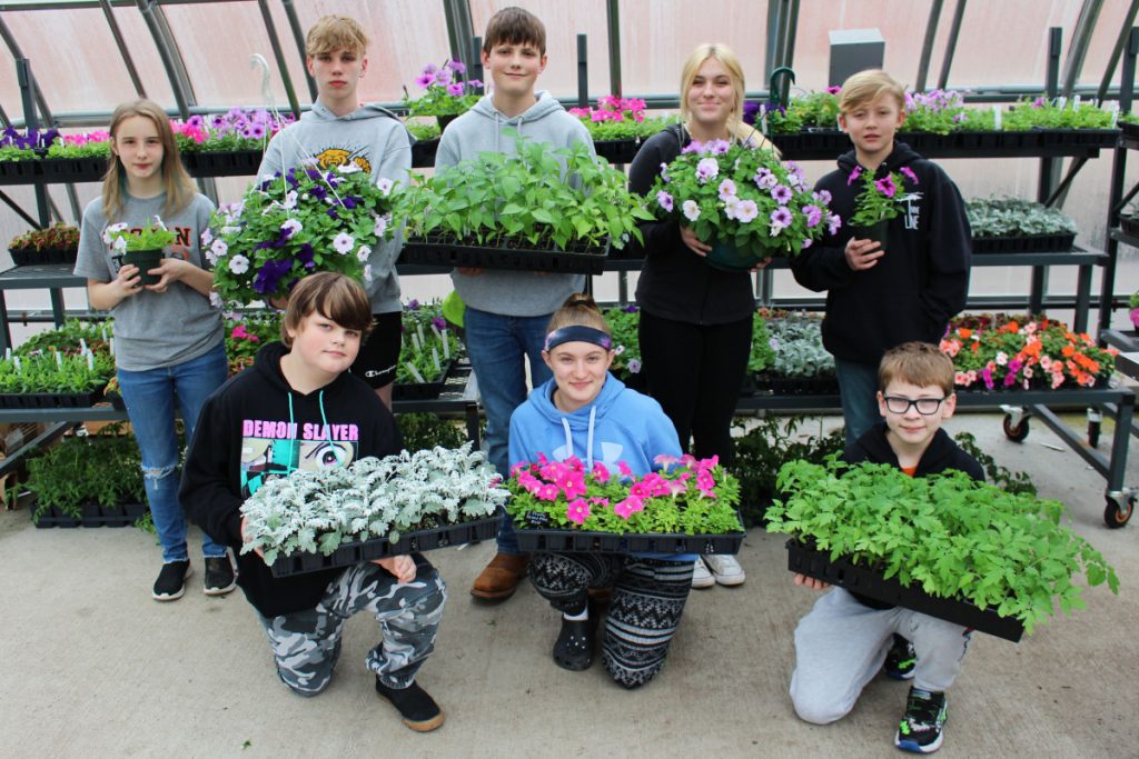 Pictured are MMS FFA students who are working in the school’s greenhouse. Front row from left: Cameron Shepherd, Ralen Arnold, Gavin Brown. Back row from left: Allaena Haught, Hunter Dunfee, Sawyer Suhodolski, Lola Garrison and Gage Davis.