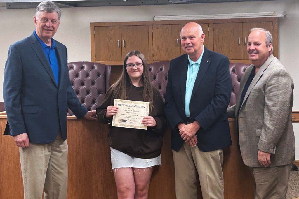 Pictured from left: Marshall County Commissioner John Gruzinskas, MMS student Lorelei Williams, Marshall County Commissioner Mike Ferro and Marshall County Commissioner Scott Varner.