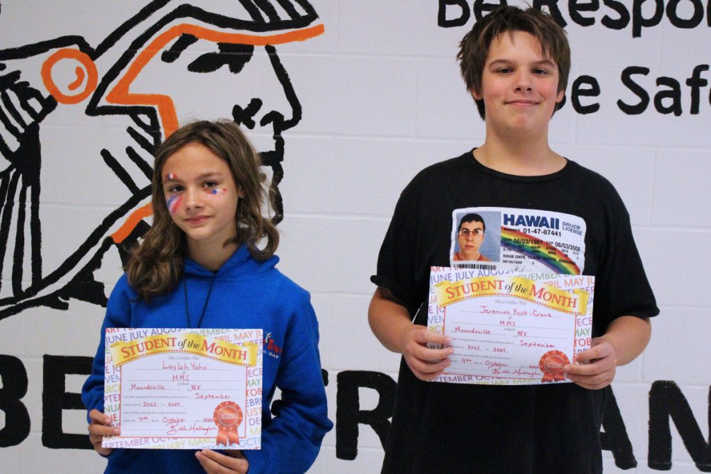 Pictured from left: Laylah Yoho and Jeremiah Yost-Crane. Gara Oliveto was absent on the day of the certificate presentation.