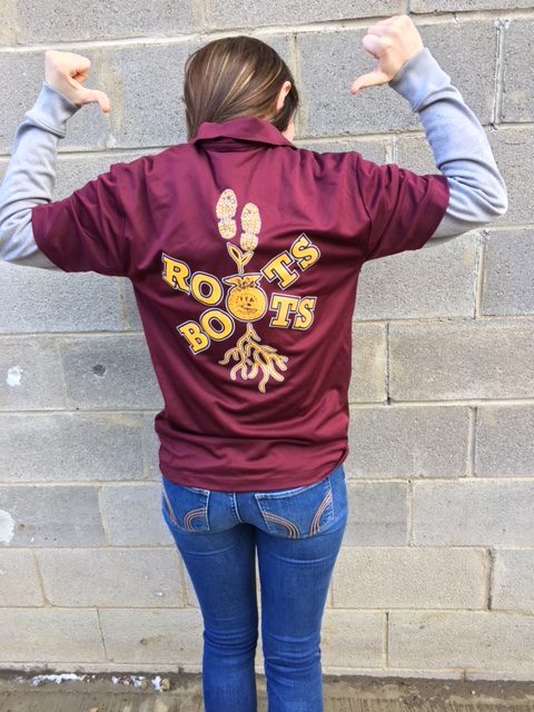 An agriculture student showing off her simulated workplace uniform!