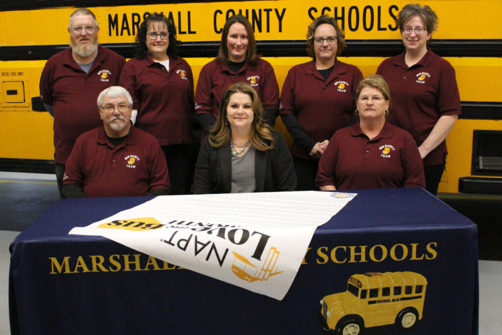 Pictured seated: Dr. Shelby Haines is flanked by MCS Safety Team members Douglas Brown and Dee Gamble. Back row from left are MCS Safety Team members: Kenny Richmond, Paula Carmichael, Kayla Kidd, Nadine McCardle and Ashley Becker.